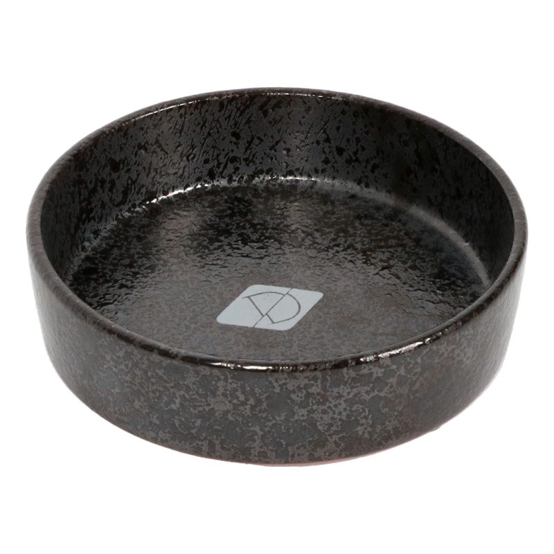 schwarz gesprenkelter Katzennapf auf Keramik